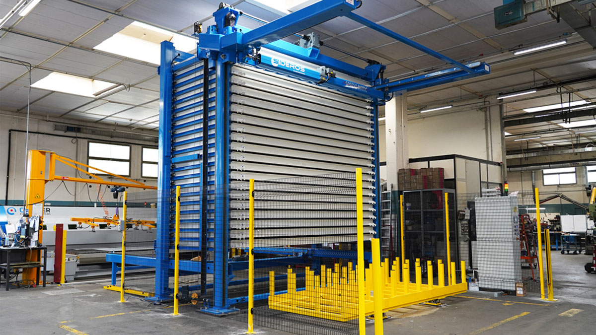 Automated storage system with safety fences and light curtains for industrial sheet metal handling